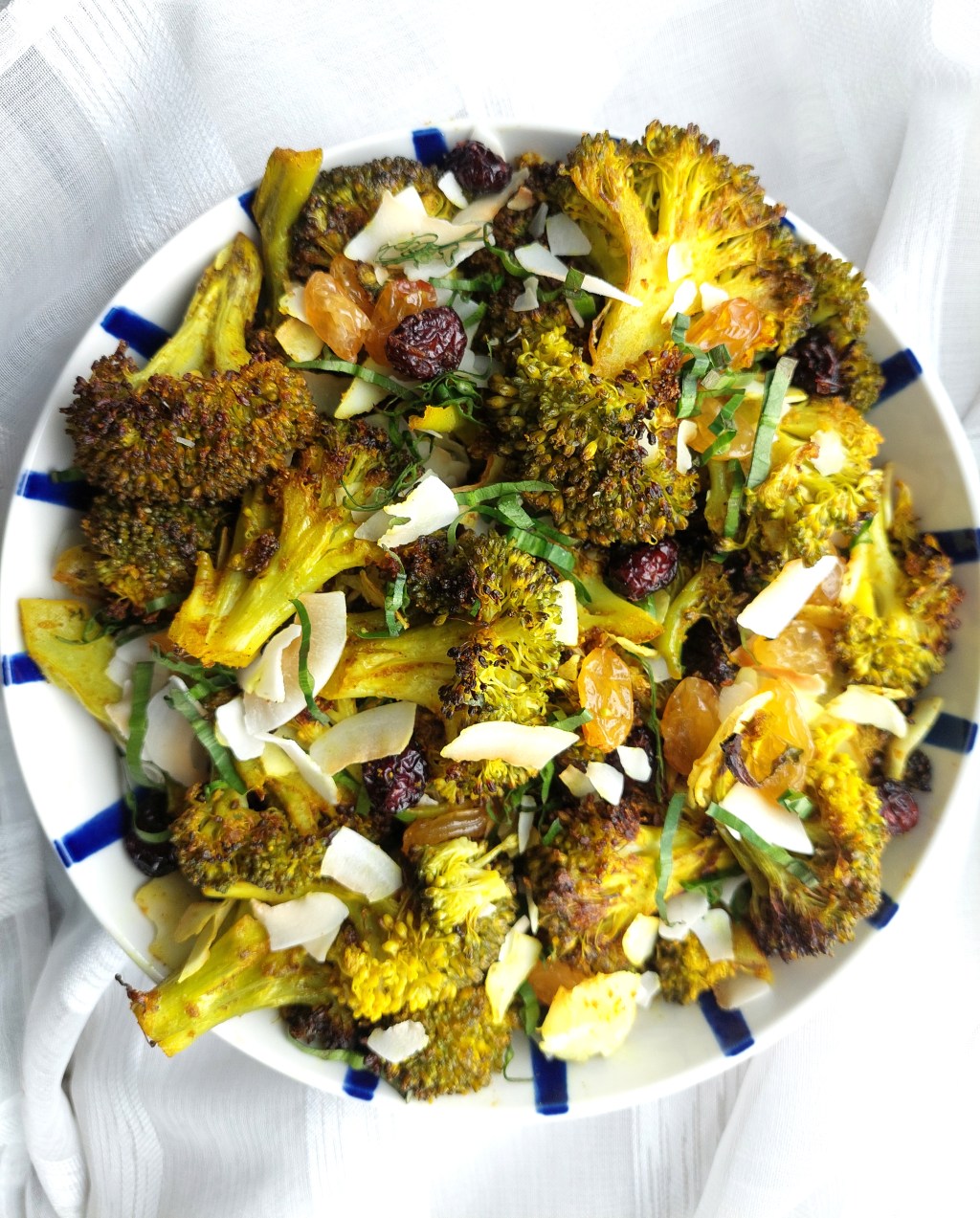 ROASTED “CURRIED” BROCCOLI WITH COCONUT SHAVINGS AND DRIED&nbsp;FRUIT